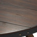 Aspen Skies Motion Cocktail Table in Russet Brown - Discount Furniture World (Burlington,NC)