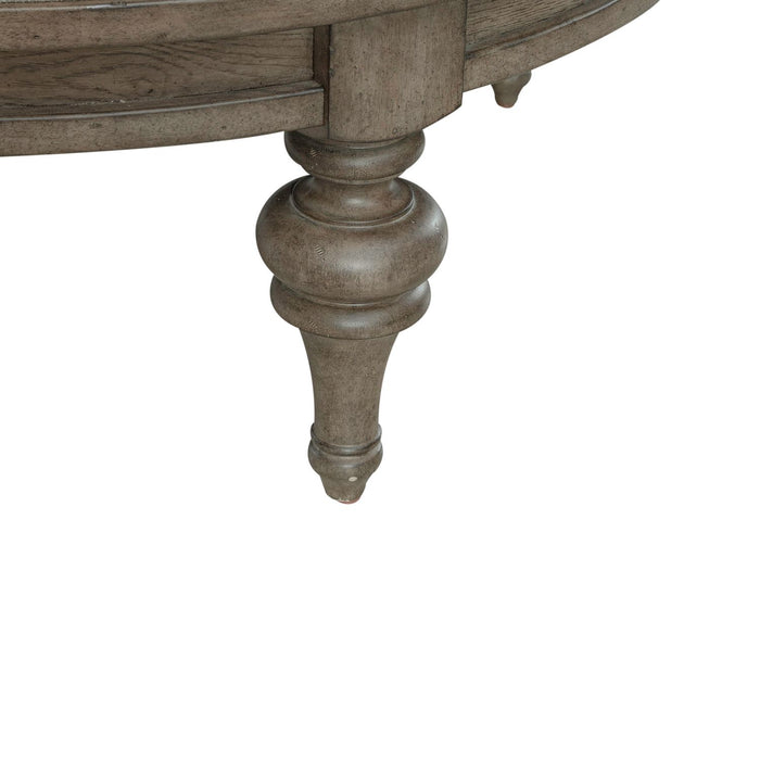 Americana Farmhouse Round Cocktail Ottoman in Dusty Taupe - Discount Furniture World (Burlington,NC)