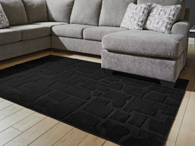 Gibbswell Washable 5' x 7' Area Rug - Discount Furniture World (Burlington,NC)